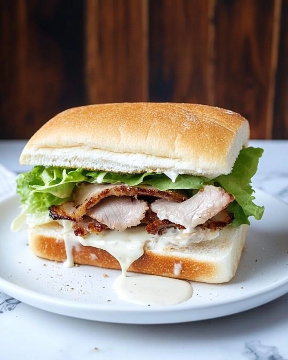 Caesar Pork Tenderloin Sandwiches, pork tenderloin sandwich recipe, easy pork sandwiches, casual lunch recipes, flavorful sandwich ideas