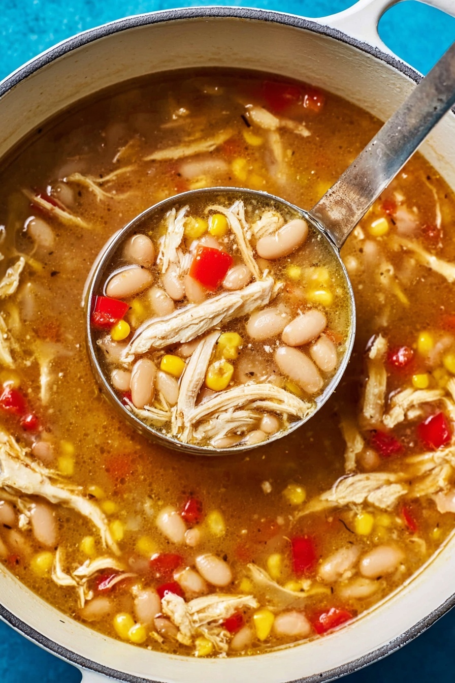 The image shows a white pot filled with a thick soup made of shredded white chicken, white beans, yellow corn kernels, and small red bell pepper pieces. The soup broth is brown and slightly shiny, looking warm and rich. A metal ladle is scooping a portion of the soup, lifting it just over the surface, showing a dense mix of chicken, beans, corn, and red peppers. The pot sits on a bright blue surface, contrasting with the white pot and the colorful soup inside. Photo taken with an iphone --ar 2:3 --v 7 - White Bean Chicken Chili, comforting chicken chili, easy white bean chili, hearty chicken and white bean stew, flavorful chili recipe