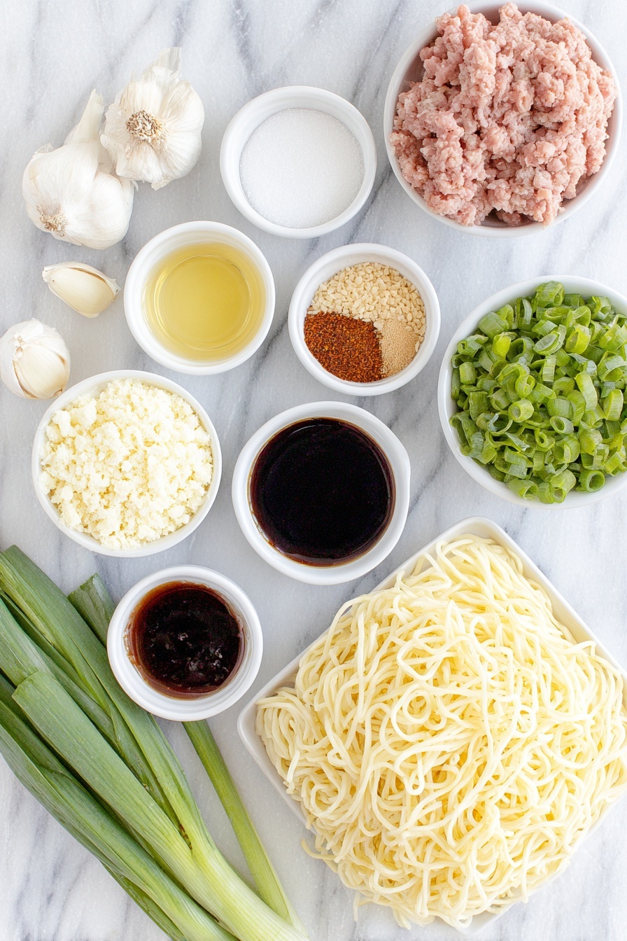 Flat lay of a small mound of thick, creamy Chinese sesame paste, a small white bowl of bright red chili paste in oil, a small white bowl of dark light soy sauce, two whole uncracked garlic cloves, a small white bowl of white granulated sugar, a small white bowl of earthy brown Chinese five spice powder, a small white bowl of finely ground reddish Sichuan pepper powder, a small white bowl of vibrant red chili oil, a small white bowl of golden chicken broth, a small white bowl of glossy dark hoisin sauce, a small white bowl of thick dark soy sauce, a small white bowl of pale golden Chinese cooking wine, a small white bowl of clear vegetable oil, a small portion of raw pink pork mince, a small pile of finely chopped deep green preserved mustard greens, a neat pile of fresh white medium-thickness wheat noodles (about 3mm thick), a bunch of fresh green choy sum stems cut into 15 cm sections, two whole green onions sliced thinly, and a small heap of coarsely chopped light brown peanuts, all arranged in perfect symmetry on simple white ceramic bowls and plates, placed on a clean white marble surface, soft natural light, photo taken with an iPhone, professional food photography style, fresh ingredients, white ceramic bowls, no bottles, no duplicates, no utensils, no packaging --ar 2:3 --v 7 --p m7354615311229779997 - Authentic Dan Dan Noodles with Pork and Sesame, Dan Dan Noodles recipe, spicy Sichuan noodles, Chinese pork noodle dish, sesame and chili noodle bowl