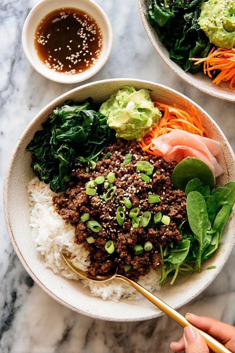 The dish is served in a white bowl filled with three main layers: at the bottom is a bed of white rice mixed with small green vegetables and thin orange carrot strips, on top is a layer of crumbly cooked brown ground meat, and on one side there are fresh green leafy lettuce and soft pink pickled ginger slices. In the center of the bowl, a small dollop of green mashed avocado is sprinkled with white sesame seeds and chopped green onions. A gold spoon rests inside the bowl against the edge, and the bowl sits on a white marbled surface next to a white cloth napkin. Photo taken with an iphone --ar 2:3 --v 7 - Korean Beef Bulgogi Rice Bowls, Korean Beef Bulgogi, Bulgogi Rice Bowls, Korean stir-fry bowls, easy Korean beef recipes