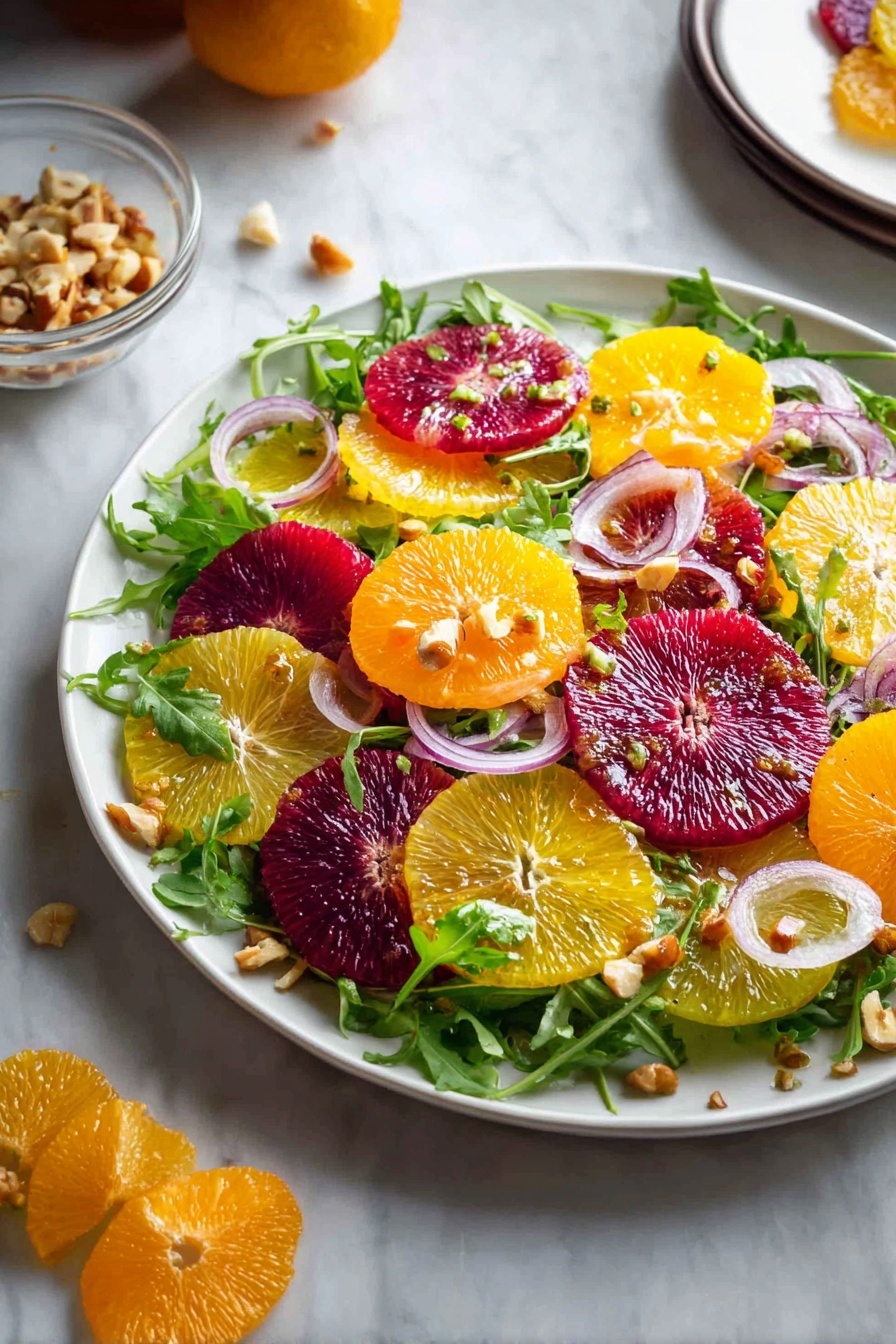A white plate sits on a white marbled surface, filled with a colorful salad made of three main layers: the bottom layer is fresh green arugula leaves; on top are many thin, round slices of different citrus fruits in bright orange, deep red, and pale yellow colors, layered evenly across the plate; scattered on the very top are thin, curved slices of light purple onion, adding a delicate texture and color contrast. Some chopped nuts appear in a clear bowl nearby, and a few onion slices and nut pieces are casually scattered around the plate. photo taken with an iphone --ar 2:3 --v 7 - Refreshing Citrus Salad with Walnut Dressing, citrus salad, walnut dressing recipe, healthy citrus salad, easy fruit salad